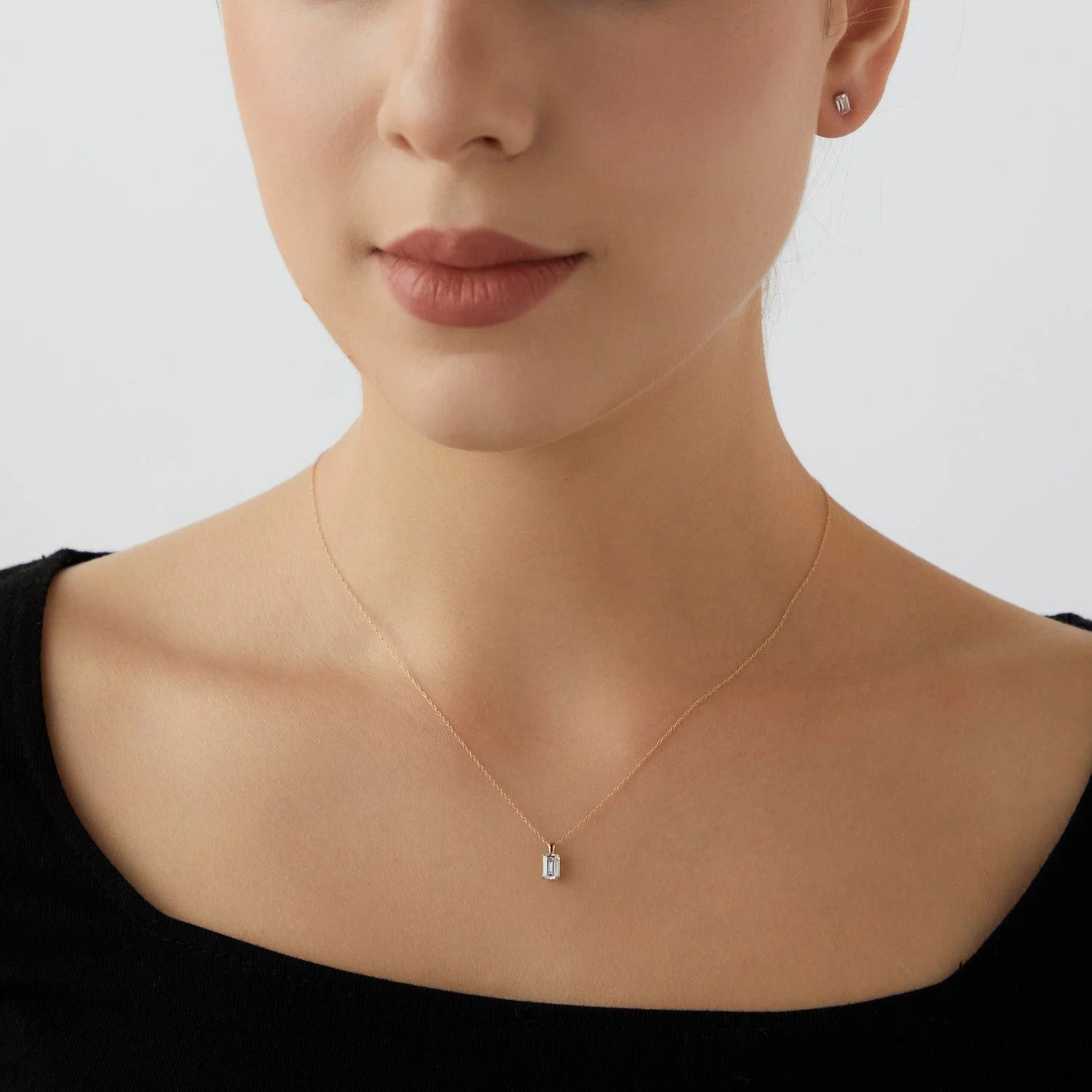 10K Yellow Gold Emerald Cut Solitaire Necklace T959601